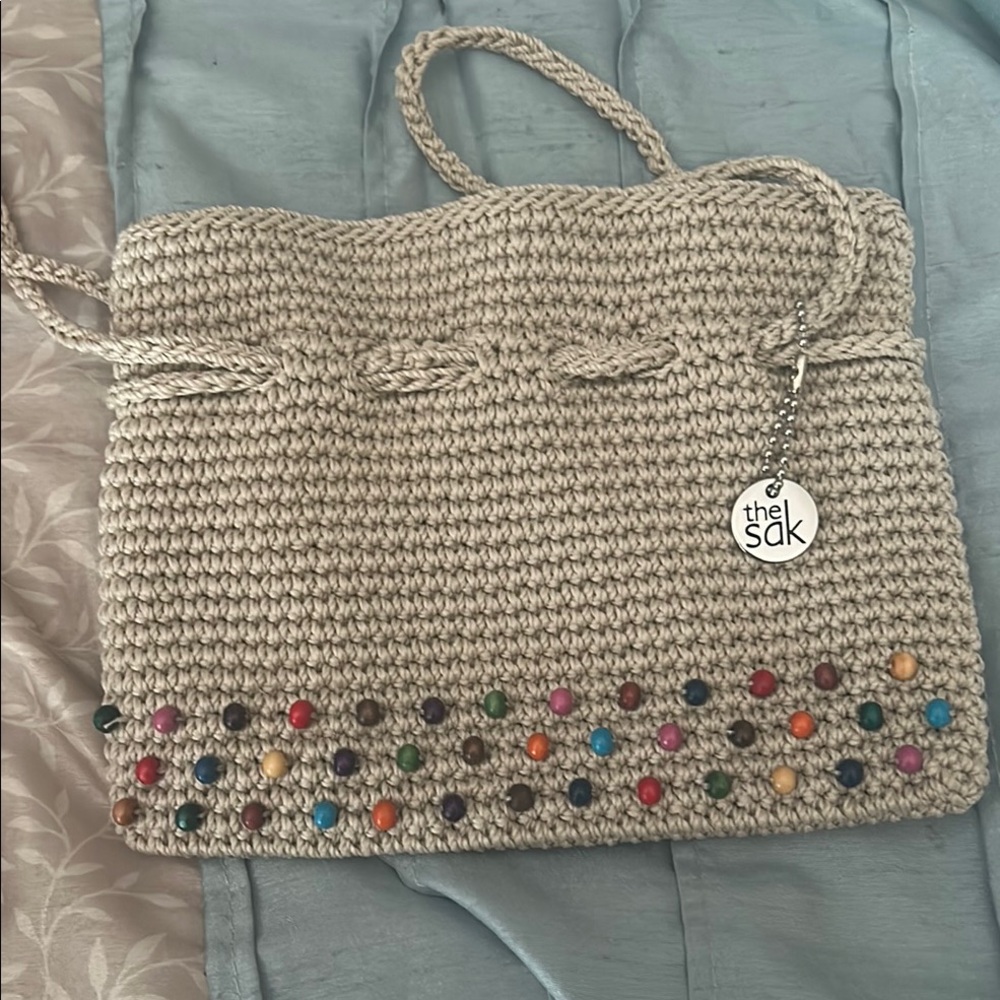The Sak Cream wristlet Crochet Design with Multicolor wood beads